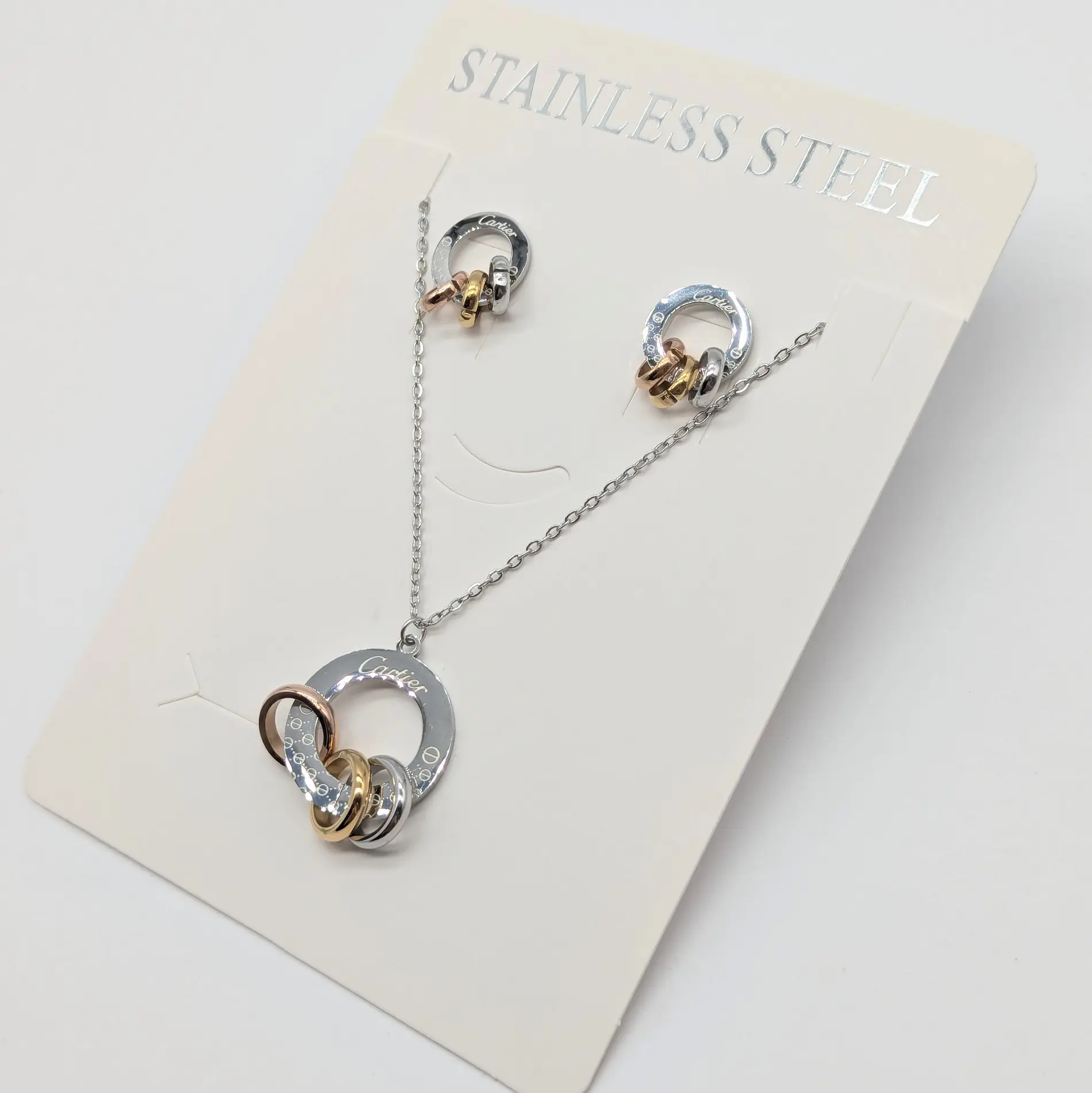 Набор Stainless Steel РС «Картье» комбинированный, длина цепочки 41+5 см Диаметр кулона 2,3 см; диаметр сережек 1,5 см